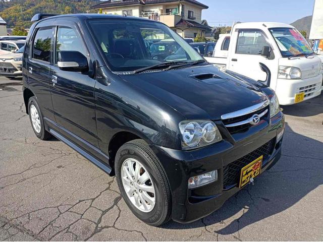 テリオスキッド カスタムX 4WD スマートキー 電動格納ミラー AT 盗難防止システム ABS CD MD アルミホイール 衝突安全ボディ エアコン パワーステアリング パワーウィンドウ 運転席エアバッグ 助手席エアバッグ(2枚目)