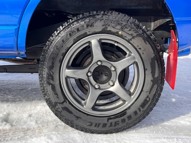 ワイルドウインド 関東仕入 シートヒーター ルーフキャリア 切替式4WD エアバック デュアルエアバック ターボ車 キーレスキー 衝突安全ボディ MD ルーフレール エアコンパワステ パワーウィンドゥ ABS付き(56枚目)