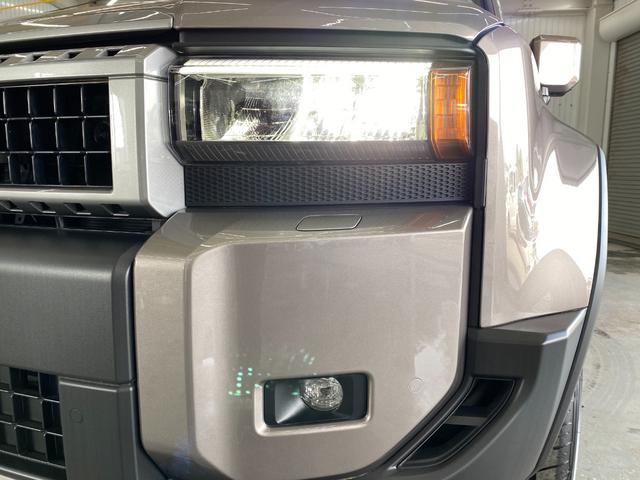 ランドクルーザー２５０ ＶＸ　全方位モニター　フルセグテレビ　Ｂｌｕｅｔｏｏｔｈ　４ＷＤ　レーンアシスト　ＥＴＣ　サンルーフ　パワーシート　衝突被害軽減システム　ルーフレール　パワーバックドア　クリアランスソナー　禁煙車　ナビＴＶ（12枚目）