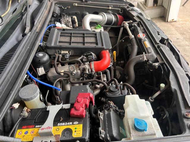 ジムニー ワイルドウインド　ＡＵＸ接続　エアコンパワステ　四駆　シートヒーター付き　メモリーナビゲーション　パワーウインドウ　ナビ・ＴＶ　エアバック　キーレス付き　ＥＴＣ車載器　フルセグテレビ　衝突安全ボディ　ダブルエアバック（67枚目）