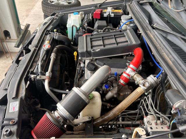 ジムニー ワイルドウインド　ＡＵＸ接続　エアコンパワステ　四駆　シートヒーター付き　メモリーナビゲーション　パワーウインドウ　ナビ・ＴＶ　エアバック　キーレス付き　ＥＴＣ車載器　フルセグテレビ　衝突安全ボディ　ダブルエアバック（68枚目）