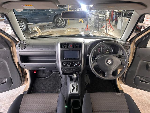ジムニー ＸＧ　ＷエアＢ　ナビＴＶ　キーレス付き　ＳＲＳ　切替４ＷＤ　エアコンパワステ　パワーウインド　ワンセグテレビ　衝撃安全ボディー　ＡＢＳ付き　メモリーナビ　メディアプレイヤー接続　ＥＴＣ付き（2枚目）
