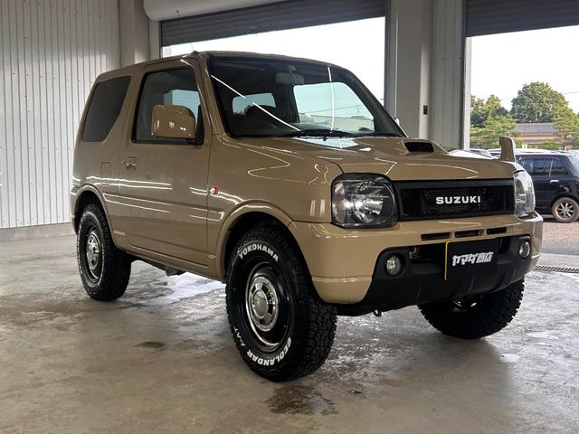 ジムニー ＸＧ　ＷエアＢ　ナビＴＶ　キーレス付き　ＳＲＳ　切替４ＷＤ　エアコンパワステ　パワーウインド　ワンセグテレビ　衝撃安全ボディー　ＡＢＳ付き　メモリーナビ　メディアプレイヤー接続　ＥＴＣ付き（4枚目）
