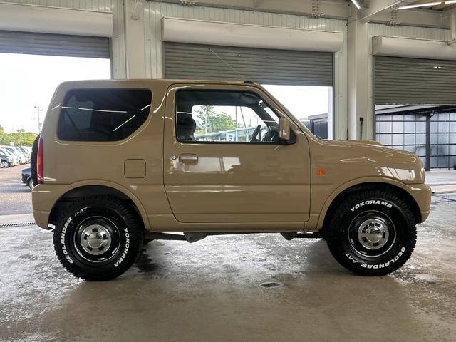 ジムニー ＸＧ　ＷエアＢ　ナビＴＶ　キーレス付き　ＳＲＳ　切替４ＷＤ　エアコンパワステ　パワーウインド　ワンセグテレビ　衝撃安全ボディー　ＡＢＳ付き　メモリーナビ　メディアプレイヤー接続　ＥＴＣ付き（5枚目）