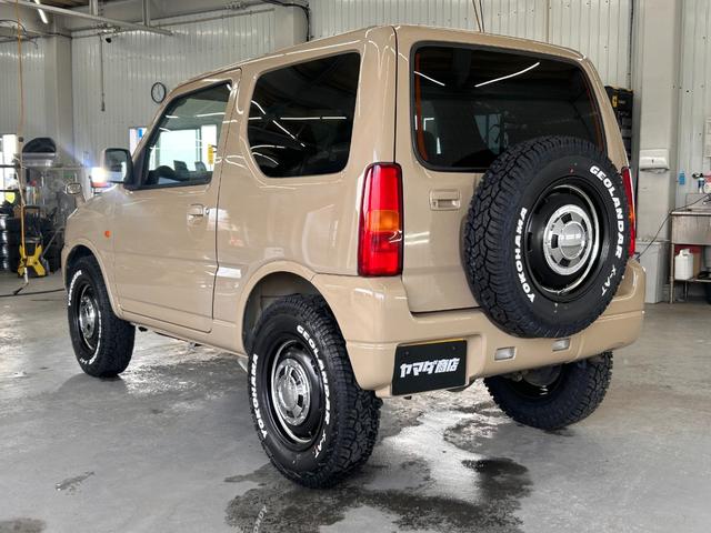 ジムニー ＸＧ　ＷエアＢ　ナビＴＶ　キーレス付き　ＳＲＳ　切替４ＷＤ　エアコンパワステ　パワーウインド　ワンセグテレビ　衝撃安全ボディー　ＡＢＳ付き　メモリーナビ　メディアプレイヤー接続　ＥＴＣ付き（8枚目）