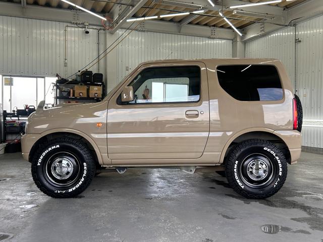 ジムニー ＸＧ　ＷエアＢ　ナビＴＶ　キーレス付き　ＳＲＳ　切替４ＷＤ　エアコンパワステ　パワーウインド　ワンセグテレビ　衝撃安全ボディー　ＡＢＳ付き　メモリーナビ　メディアプレイヤー接続　ＥＴＣ付き（9枚目）