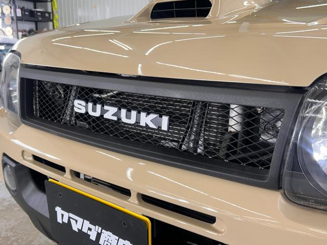 ジムニー ＸＧ　ＷエアＢ　ナビＴＶ　キーレス付き　ＳＲＳ　切替４ＷＤ　エアコンパワステ　パワーウインド　ワンセグテレビ　衝撃安全ボディー　ＡＢＳ付き　メモリーナビ　メディアプレイヤー接続　ＥＴＣ付き（13枚目）