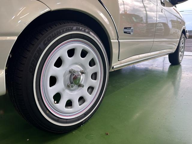 ミラジーノ ミニライトスペシャル　オルタネータ交換（Ｒ７年１１月）　新品ホワイトリボンタイヤ　新品ブラウンシートカバー　ＮＡＲＤＩステアリング＆シフトノブ　ホワイトホイール　新品フロアマット　純正ホワイトカラー　ＵＳＢ接続オーディオ（11枚目）