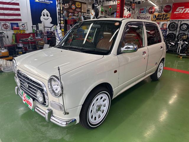 ミラジーノ ミニライトスペシャル　オルタネータ交換（Ｒ７年１１月）　新品ホワイトリボンタイヤ　新品ブラウンシートカバー　ＮＡＲＤＩステアリング＆シフトノブ　ホワイトホイール　新品フロアマット　純正ホワイトカラー　ＵＳＢ接続オーディオ（13枚目）