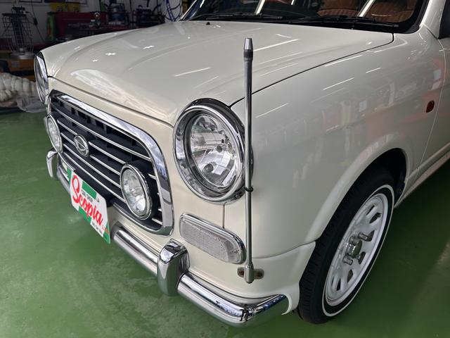 ミラジーノ ミニライトスペシャル　オルタネータ交換（Ｒ７年１１月）　新品ホワイトリボンタイヤ　新品ブラウンシートカバー　ＮＡＲＤＩステアリング＆シフトノブ　ホワイトホイール　新品フロアマット　純正ホワイトカラー　ＵＳＢ接続オーディオ（15枚目）