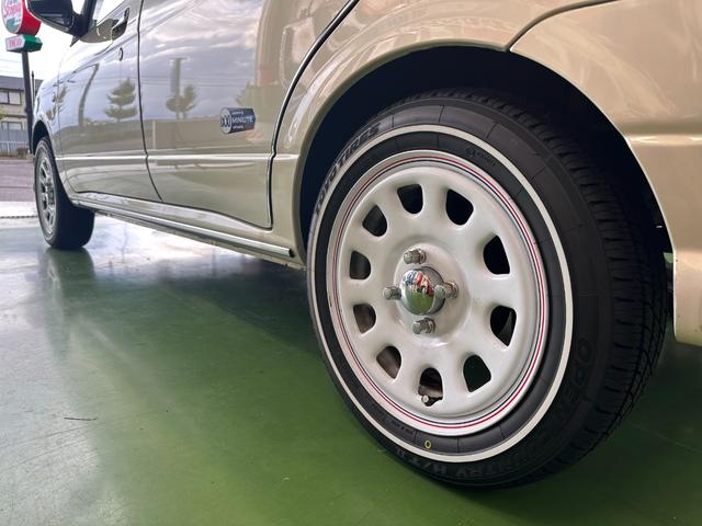 ミラジーノ ミニライトスペシャル　オルタネータ交換（Ｒ７年１１月）　新品ホワイトリボンタイヤ　新品ブラウンシートカバー　ＮＡＲＤＩステアリング＆シフトノブ　ホワイトホイール　新品フロアマット　純正ホワイトカラー　ＵＳＢ接続オーディオ（19枚目）