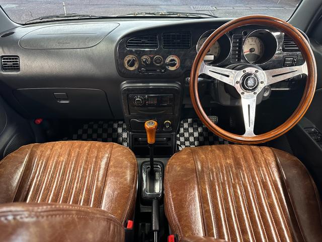 ミラジーノ ミニライトスペシャル　オルタネータ交換（Ｒ７年１１月）　新品ホワイトリボンタイヤ　新品ブラウンシートカバー　ＮＡＲＤＩステアリング＆シフトノブ　ホワイトホイール　新品フロアマット　純正ホワイトカラー　ＵＳＢ接続オーディオ（25枚目）