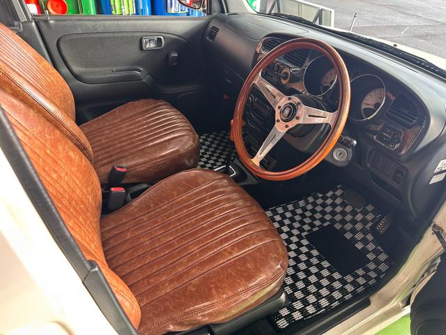 ミラジーノ ミニライトスペシャル　オルタネータ交換（Ｒ７年１１月）　新品ホワイトリボンタイヤ　新品ブラウンシートカバー　ＮＡＲＤＩステアリング＆シフトノブ　ホワイトホイール　新品フロアマット　純正ホワイトカラー　ＵＳＢ接続オーディオ（27枚目）