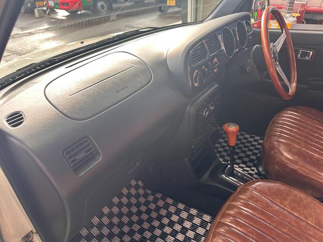 ミラジーノ ミニライトスペシャル　オルタネータ交換（Ｒ７年１１月）　新品ホワイトリボンタイヤ　新品ブラウンシートカバー　ＮＡＲＤＩステアリング＆シフトノブ　ホワイトホイール　新品フロアマット　純正ホワイトカラー　ＵＳＢ接続オーディオ（34枚目）