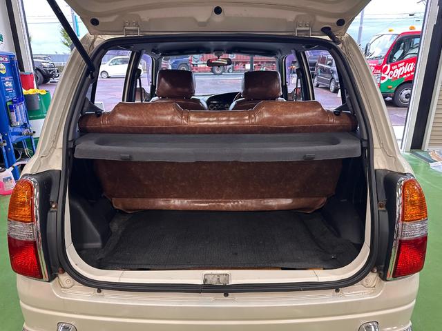 ミラジーノ ミニライトスペシャル　オルタネータ交換（Ｒ７年１１月）　新品ホワイトリボンタイヤ　新品ブラウンシートカバー　ＮＡＲＤＩステアリング＆シフトノブ　ホワイトホイール　新品フロアマット　純正ホワイトカラー　ＵＳＢ接続オーディオ（56枚目）