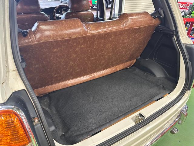 ミラジーノ ミニライトスペシャル　オルタネータ交換（Ｒ７年１１月）　新品ホワイトリボンタイヤ　新品ブラウンシートカバー　ＮＡＲＤＩステアリング＆シフトノブ　ホワイトホイール　新品フロアマット　純正ホワイトカラー　ＵＳＢ接続オーディオ（59枚目）