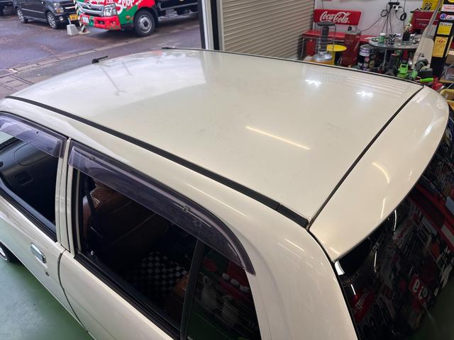 ミラジーノ ミニライトスペシャル　オルタネータ交換（Ｒ７年１１月）　新品ホワイトリボンタイヤ　新品ブラウンシートカバー　ＮＡＲＤＩステアリング＆シフトノブ　ホワイトホイール　新品フロアマット　純正ホワイトカラー　ＵＳＢ接続オーディオ（65枚目）