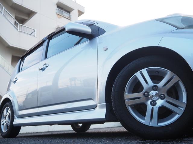 パッソ レーシー TRDスポーツ 5MT TRDスポーツサスペンション TRDスポーツマフラー 純正14インチAW 純正MOMOステアリング 社外SDナビ BT 地デジ HID フォグLED ETC 社外アルミペダル(11枚目)