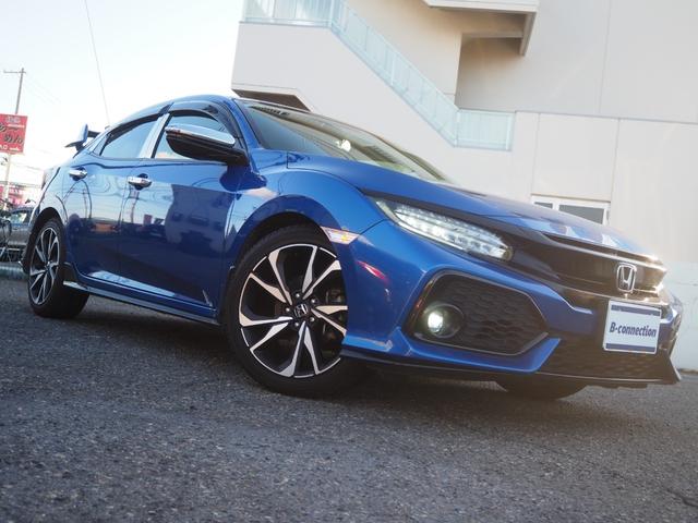 シビック ハッチバック　純正ナビ　バックカメラ　ホンダセンシング　レーダークルーズ　純正リアウィング　純正１８インチアルミホイール　パドルシフト　地デジ　シートヒーター　ＥＴＣ　ＬＥＤヘッドライト　シートカバー　純正ドラレコ（10枚目）