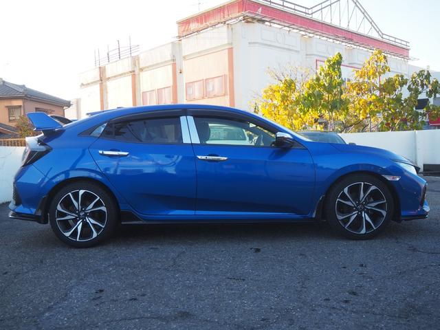 シビック ハッチバック　純正ナビ　バックカメラ　ホンダセンシング　レーダークルーズ　純正リアウィング　純正１８インチアルミホイール　パドルシフト　地デジ　シートヒーター　ＥＴＣ　ＬＥＤヘッドライト　シートカバー　純正ドラレコ（33枚目）