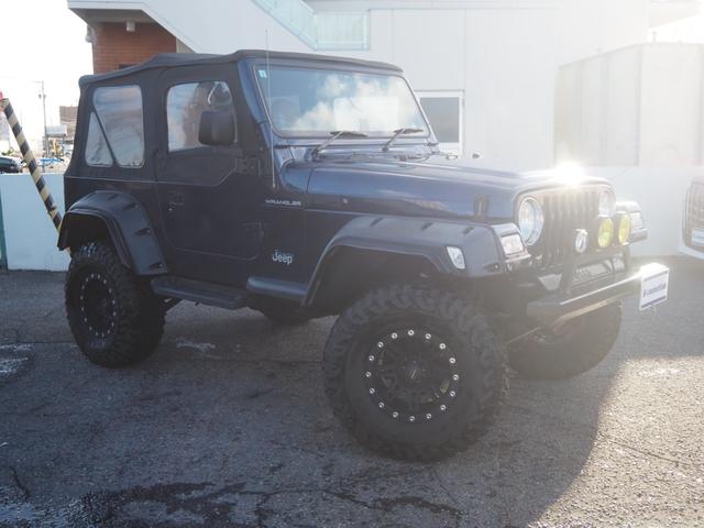 ジープ・ラングラー スペシャルエディション　ソフトトップ　ショートバンパー　リフトアップ　社外ＬＥＤヘッドライト　背面タイヤ　１ナンバー変更　レザー調シートカバー　ヒッチメンバー　カロッツェリアオーディオ　オーバーフェンダー　ＥＴＣ（25枚目）