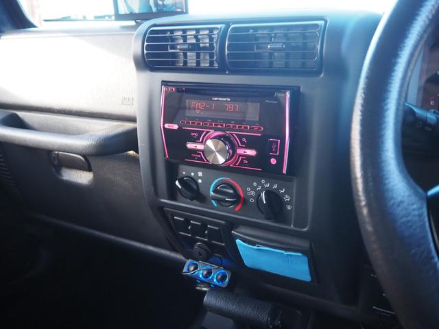 ジープ・ラングラー スペシャルエディション　ソフトトップ　ショートバンパー　リフトアップ　社外ＬＥＤヘッドライト　背面タイヤ　１ナンバー変更　レザー調シートカバー　ヒッチメンバー　カロッツェリアオーディオ　オーバーフェンダー　ＥＴＣ（64枚目）