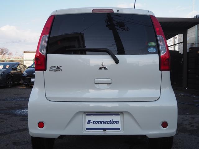 ｅＫワゴン Ｅ　クラリオンＳＤナビ　地デジ　ＢＴ接続　純正ホイールキャップ　キーレス　シートヒーター　ヘッドライトレベライザー　ベンチシート　電格ミラー　エアコン　ドアバイザー　フロアマット　ハロゲンヘッドライト（9枚目）