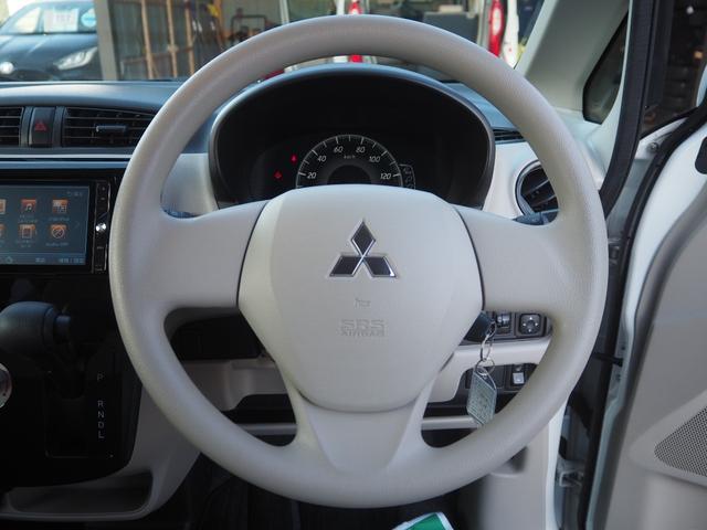 ｅＫワゴン Ｅ　クラリオンＳＤナビ　地デジ　ＢＴ接続　純正ホイールキャップ　キーレス　シートヒーター　ヘッドライトレベライザー　ベンチシート　電格ミラー　エアコン　ドアバイザー　フロアマット　ハロゲンヘッドライト（17枚目）