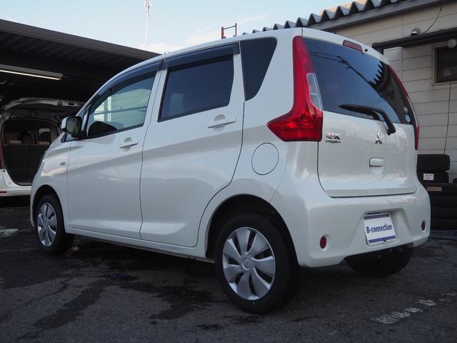 ｅＫワゴン Ｅ　クラリオンＳＤナビ　地デジ　ＢＴ接続　純正ホイールキャップ　キーレス　シートヒーター　ヘッドライトレベライザー　ベンチシート　電格ミラー　エアコン　ドアバイザー　フロアマット　ハロゲンヘッドライト（30枚目）