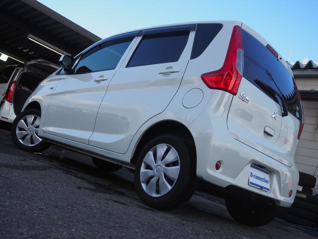 ｅＫワゴン Ｅ　クラリオンＳＤナビ　地デジ　ＢＴ接続　純正ホイールキャップ　キーレス　シートヒーター　ヘッドライトレベライザー　ベンチシート　電格ミラー　エアコン　ドアバイザー　フロアマット　ハロゲンヘッドライト（32枚目）