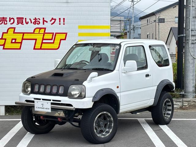 ジムニー XG 5MT エアコン 普通車登録(オーバーフェンダー) リフトアップ FRPボンネット 社外15インチアルミホイール ETC(2枚目)