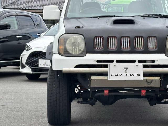 ジムニー XG 5MT エアコン 普通車登録(オーバーフェンダー) リフトアップ FRPボンネット 社外15インチアルミホイール ETC(18枚目)
