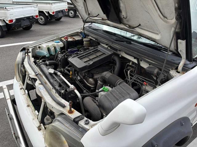 ジムニー XG 5MT エアコン 普通車登録(オーバーフェンダー) リフトアップ FRPボンネット 社外15インチアルミホイール ETC(23枚目)