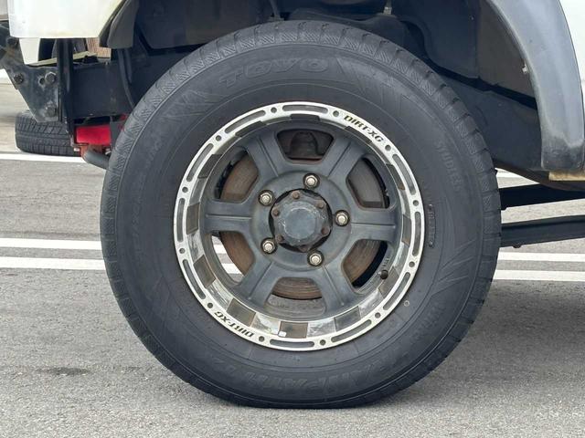 ジムニー XG 5MT エアコン 普通車登録(オーバーフェンダー) リフトアップ FRPボンネット 社外15インチアルミホイール ETC(32枚目)