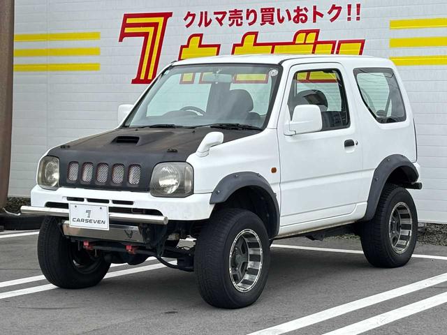 ジムニー XG 5MT エアコン 普通車登録(オーバーフェンダー) リフトアップ FRPボンネット 社外15インチアルミホイール ETC(33枚目)