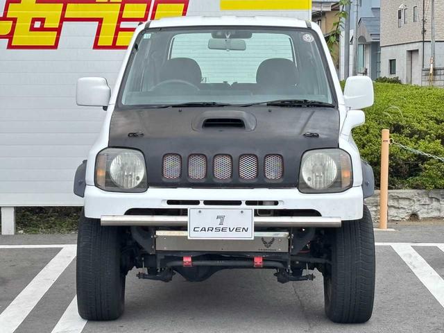 ジムニー XG 5MT エアコン 普通車登録(オーバーフェンダー) リフトアップ FRPボンネット 社外15インチアルミホイール ETC(34枚目)