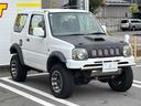 XG 5MT エアコン 普通車登録(オーバーフェンダー) リフトアップ FRPボンネット 社外15インチアルミホイール ETC(35枚目)