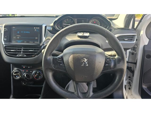 ２０８ スタイル　ＥＴＣ　ナビゲーション　ＭＴ５　関東仕入　エアバッグ　ＡＢＳ　ＥＳＣ　ＵＳＢ入力端子　Ｂｌｕｅｔｏｏｔｈ接続　エアコン　パワステ　パワーウィンドウ（27枚目）