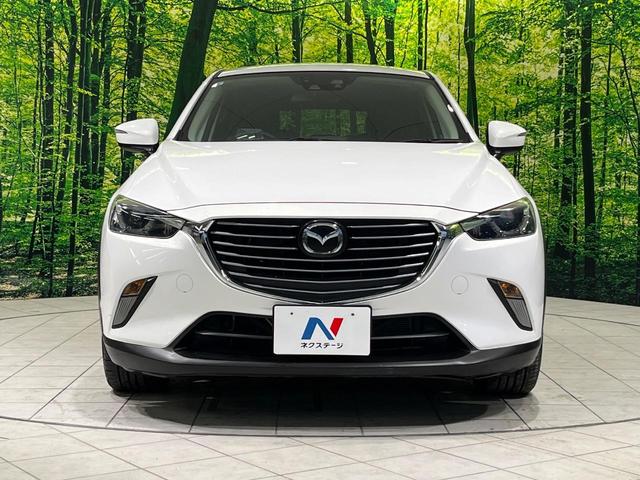 ＣＸ－３ ＸＤ　ツーリング　マツダコネクトナビ　バックカメラ　衝突軽減　ＥＴＣ　Ｂｌｕｅｔｏｏｔｈ　革巻きステアリング　ＬＥＤヘッド　オートエアコン　オートライト　電動格納ミラー　プライバシーガラス　バニティミラー　スマートキー（12枚目）