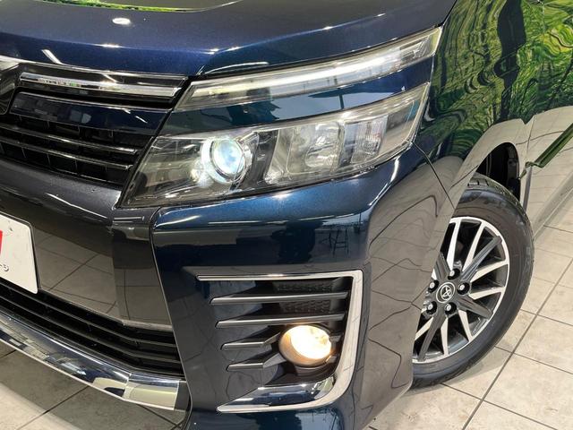 ヴォクシー ＺＳ　４ＷＤ　純正９インチナビ　フリップダウンモニター　寒冷地仕様　バックカメラ　両側パワースライドドア　Ｂｌｕｅｔｏｏｔｈ　フルセグ　ＥＴＣ　ドラレコ　ＬＥＤヘッド　革巻きステアリング　オートエアコン（13枚目）
