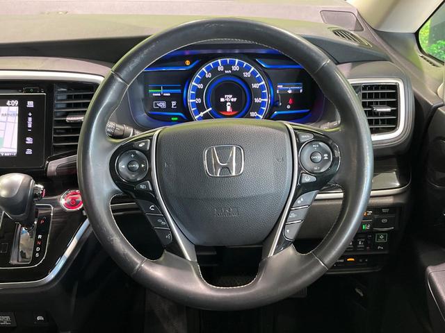 オデッセイハイブリッド ハイブリッドアブソルート・EXホンダセンシング 後席モニター 純正ナビ バックカメラ 衝突軽減 アダプティブクルーズ 両側電動スライドドア Bluetooth フルセグ ETC ドラレコ LEDヘッド・フォグ リアオートエアコン 革巻きステアリング(12枚目)