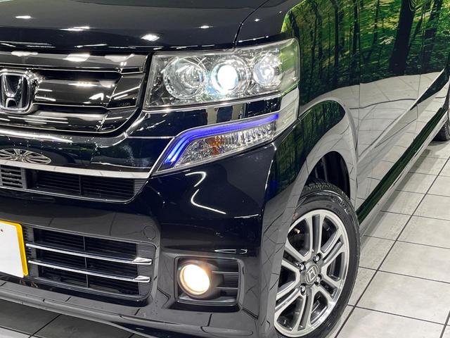 N-BOXカスタム G・Lパッケージ 純正ナビ バックカメラ 両側パワースライドドア ETC HIDヘッド オートライト オートエアコン パワーウインドウ プライバシーガラス 電動格納ミラー ステリモ プッシュスタート スマートキー(12枚目)