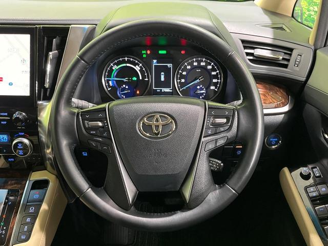 アルファードハイブリッド Ｘ　８人乗　４ＷＤ　後席モニター　ＪＢＬサウンド　純正１０．５型ナビ　全周囲カメラ　衝突軽減　レーダークルーズ　両側電動スライドドア　フルセグ　Ｂｌｕｅｔｏｏｔｈ　ＥＴＣ　ドラレコ　リアオートエアコン（12枚目）