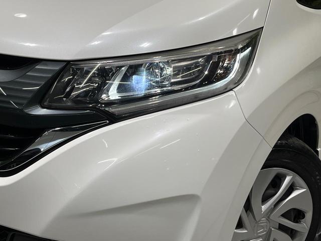 フリード Ｇ・ホンダセンシング　６人乗　純正ナビ　バックカメラ　衝突軽減　アダプティブクルーズ　両側電動スライドドア　フルセグ　Ｂｌｕｅｔｏｏｔｈ　ＥＴＣ　ドラレコ　ＬＥＤヘッド　オートエアコン　オートライト　ステアリングスイッチ（13枚目）