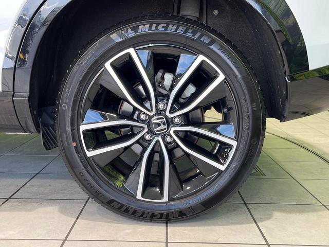 ヴェゼル e:HEV Z 4WD 寒冷地仕様 純正8インチナビ バックカメラ 衝突軽減 ブラインドスポットモニター パワーバックドア 革巻きステアリング LEDヘッド オートエアコン オートライト プッシュスタート ステリモ(56枚目)