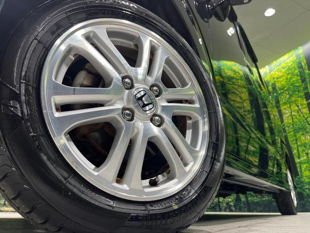 Ｎ－ＢＯＸカスタム Ｇ・Ｌパッケージ　４ＷＤ　ＳＤナビ　バックカメラ　横滑り防止機能　パワースライドドア　ＨＩＤヘッド　オートエアコン　オートライト　電動格納ミラー　プライバシーガラス　アイドリングストップ　プッシュスタート　スマートキー（13枚目）