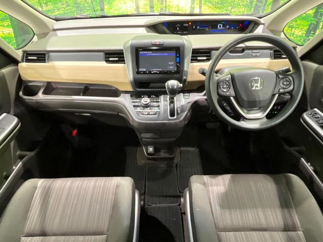 フリード Ｇ・ホンダセンシング　４ＷＤ　寒冷地仕様　純正ナビ　両側パワスラ　衝突軽減　レーダークルーズ　バックカメラ　Ｂｌｕｅｔｏｏｔｈ　ＥＴＣ　シートヒーター　オートエアコン　スマートキー　電動格納ミラー　横滑り防止装置（2枚目）