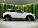 ＸＤ　ツーリング　マツダコネクトナビ　バックカメラ　衝突軽減　ＥＴＣ　Ｂｌｕｅｔｏｏｔｈ　革巻きステアリング　ＬＥＤヘッド　オートエアコン　オートライト　電動格納ミラー　プライバシーガラス　バニティミラー　スマートキー（59枚目）
