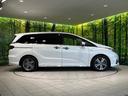 ハイブリッドアブソルート・EXホンダセンシング 後席モニター 純正ナビ バックカメラ 衝突軽減 アダプティブクルーズ 両側電動スライドドア Bluetooth フルセグ ETC ドラレコ LEDヘッド・フォグ リアオートエアコン 革巻きステアリング(62枚目)
