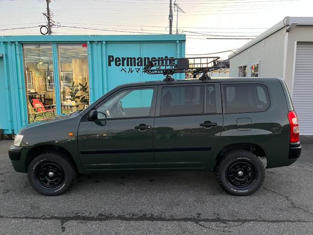 サクシードワゴン ＴＸ　Ｇパッケージリミテッド　グリーン全塗装・マット仕上・ＭＴタイヤ・ナビ・ＴＶ・ＥＴＣ・電動格納ミラー・ルーフラック・レザーシートカバー（3枚目）